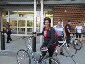 Annette Dickerson arrives at work on Bike to Work Day